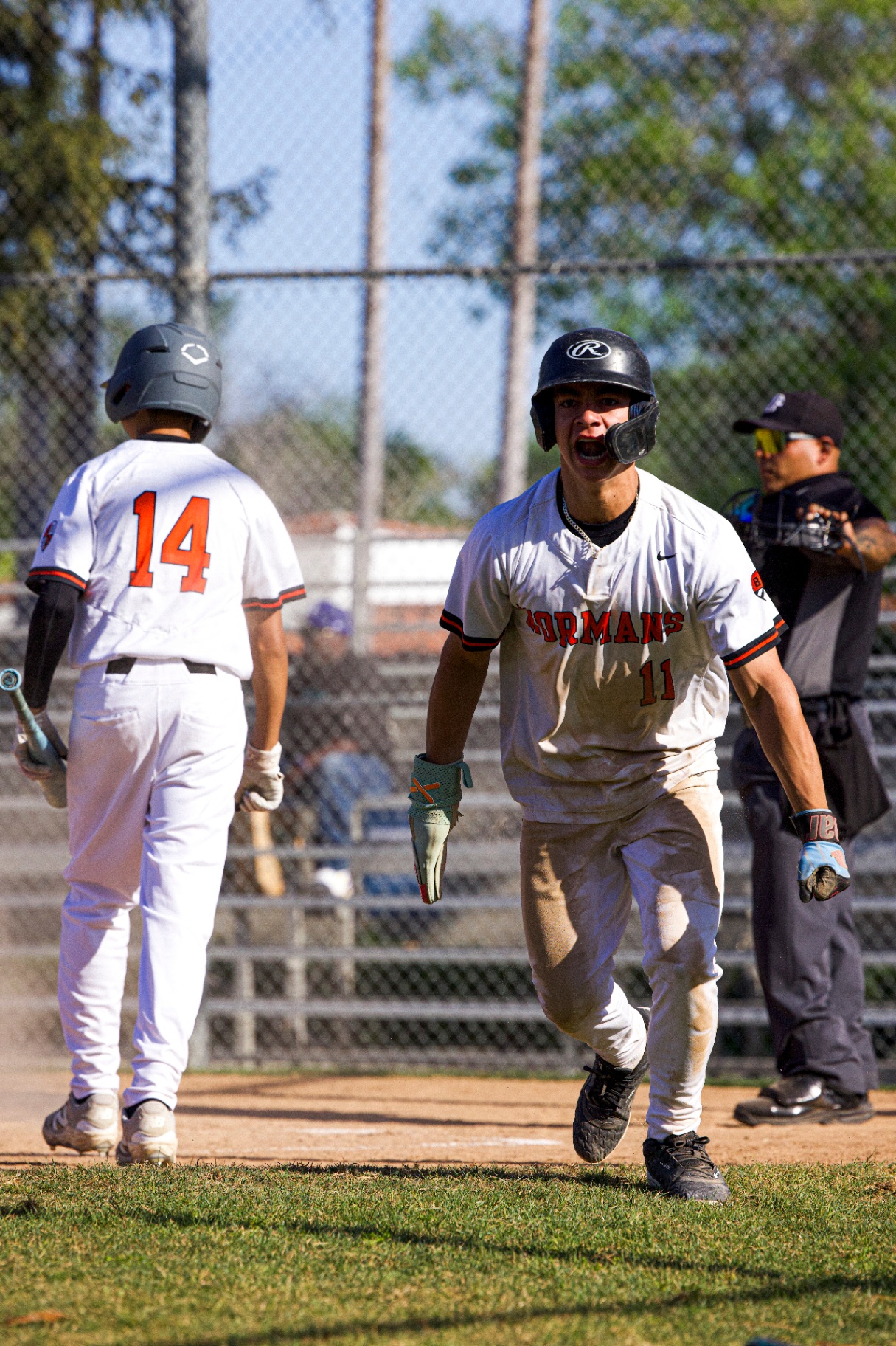 Fed Ramirez celebrating, running in after a scoring play